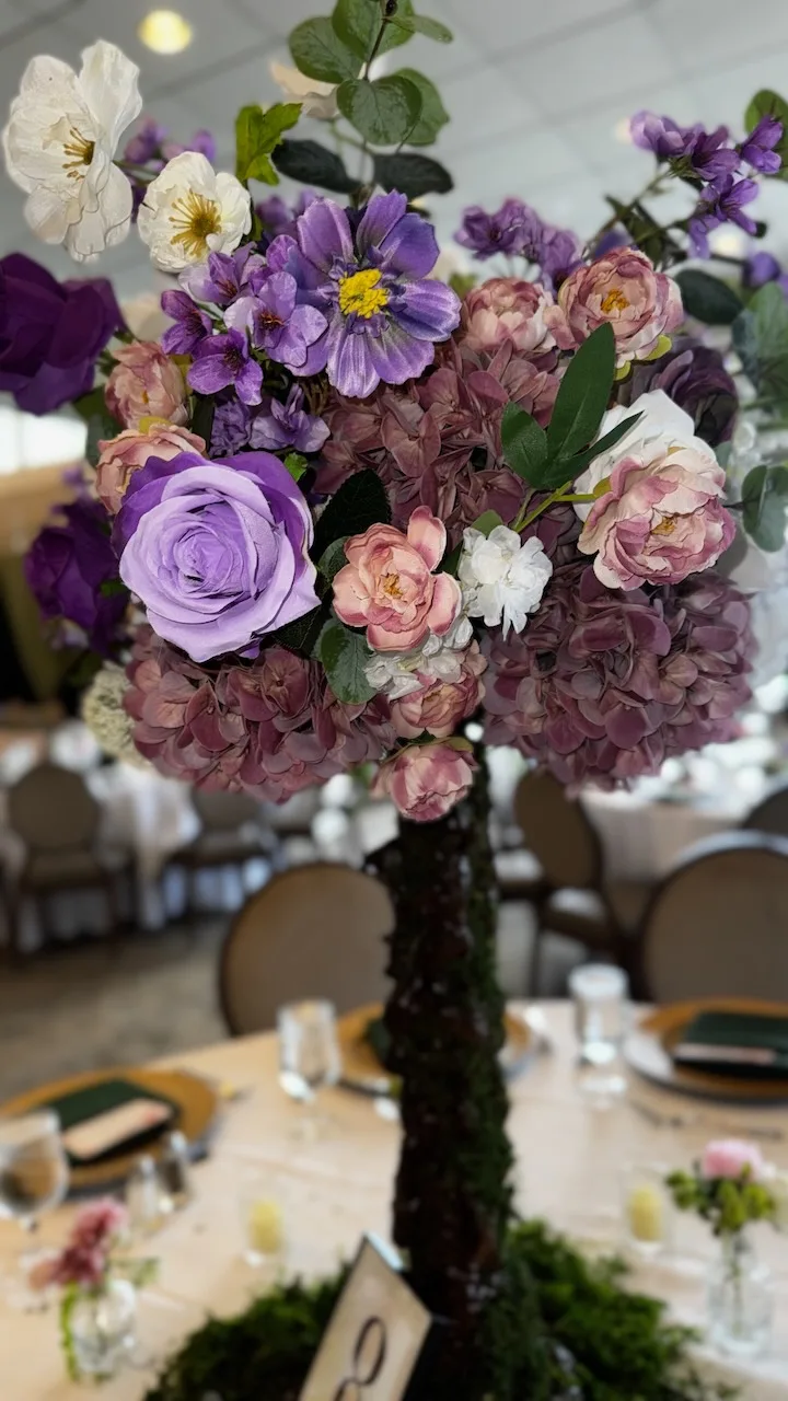 Pink quinceañera stage decor with floral accents, Springfield VA