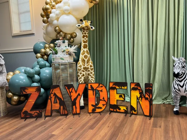 Full room view of baby shower decor at Casey Community Center in Gaithersburg, MD