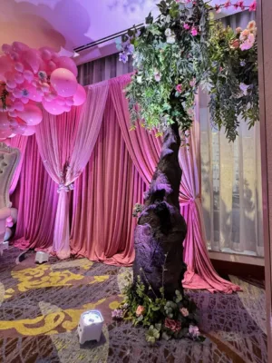 Grand ballroom with pink drapery for the quinceañera at Hilton BWI