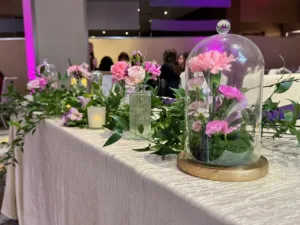 Balloon garland in blush tones at the quinceañera entrance