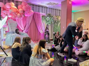 Sweetheart table with ornate chairs at the quinceañera in BWI, MD