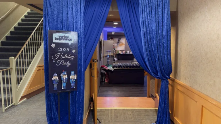Holiday party setup with blue drapery and white linen covered tables, Ellicott City MD
